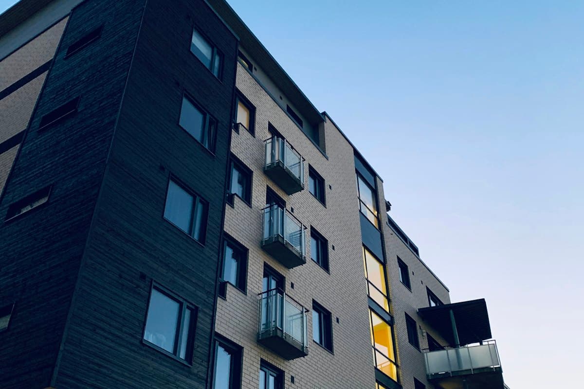 Multi-story apartment building seen from below