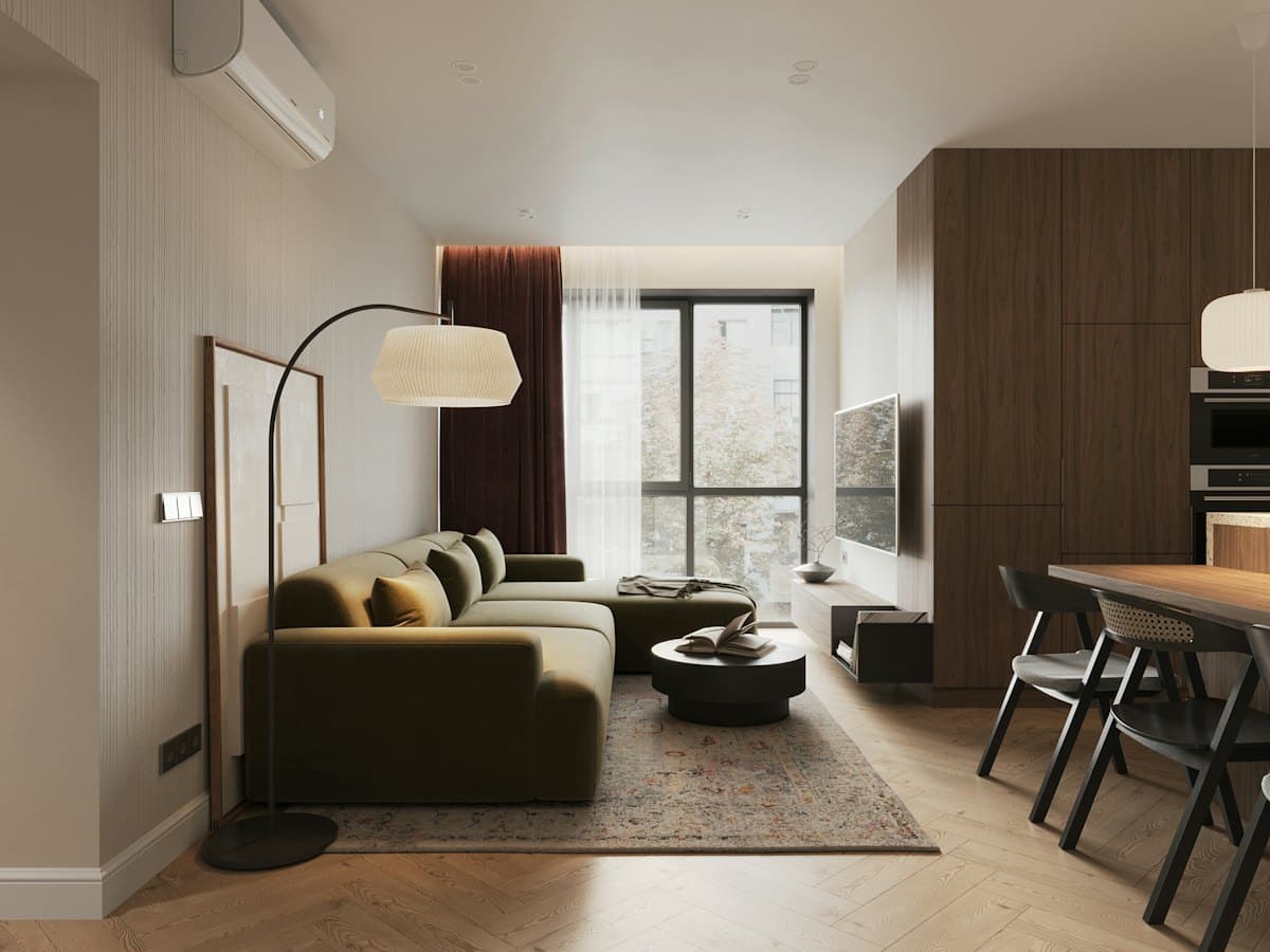Warmly lit living room with timber joinery